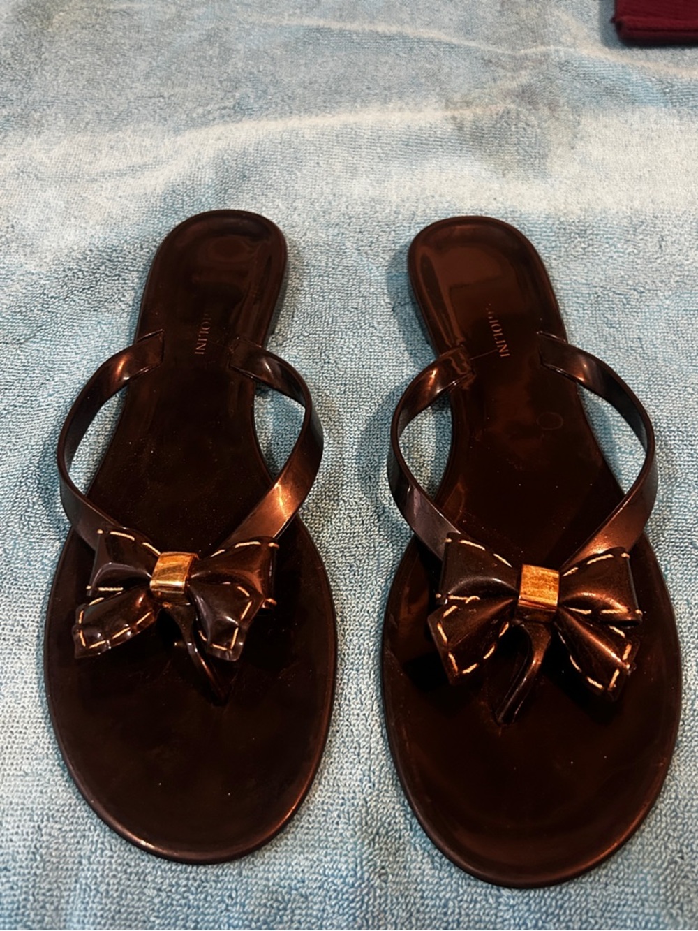 Enzo Angiolini Black Jelly Slide Sandals with Gold Bow Accent